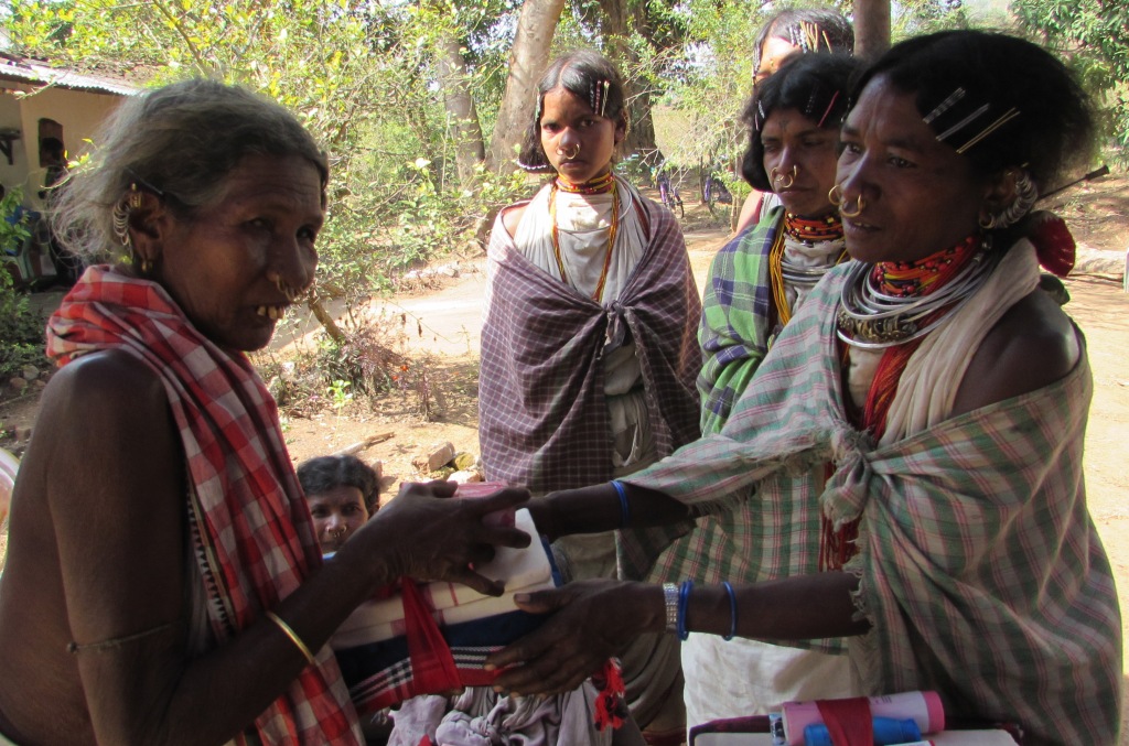 Giving Love Bundles to aged Tribal women, aged leprosy patients in the colonies we visit on the bike ride is part of the story of care and concern for truly poverty line people.
